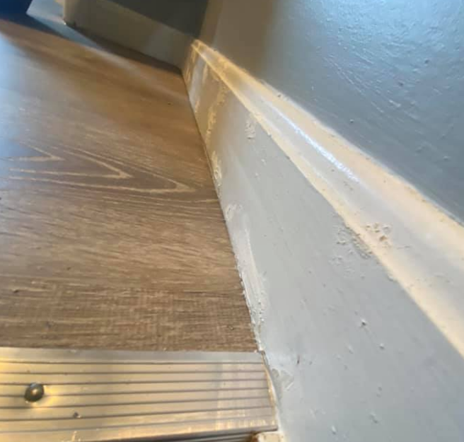 How to fill gap between baseboard and floor?